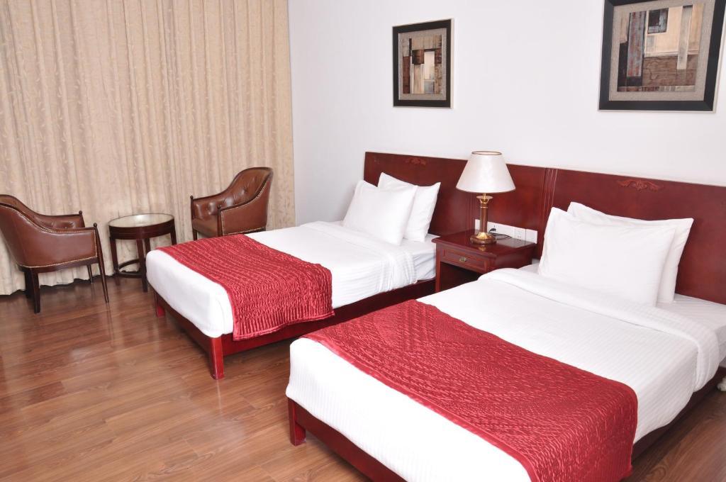 Lilywhite Hotel Nuova Delhi Camera foto
